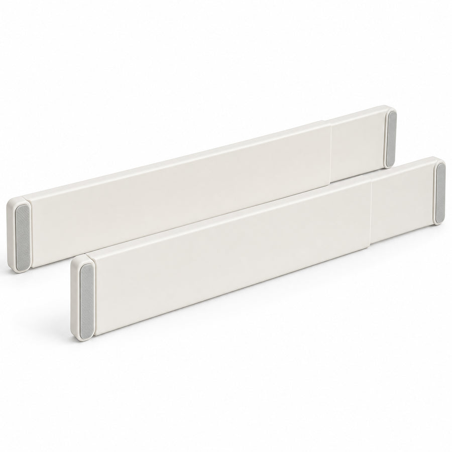 Set of two warm-white adjustable drawer dividers on a white background